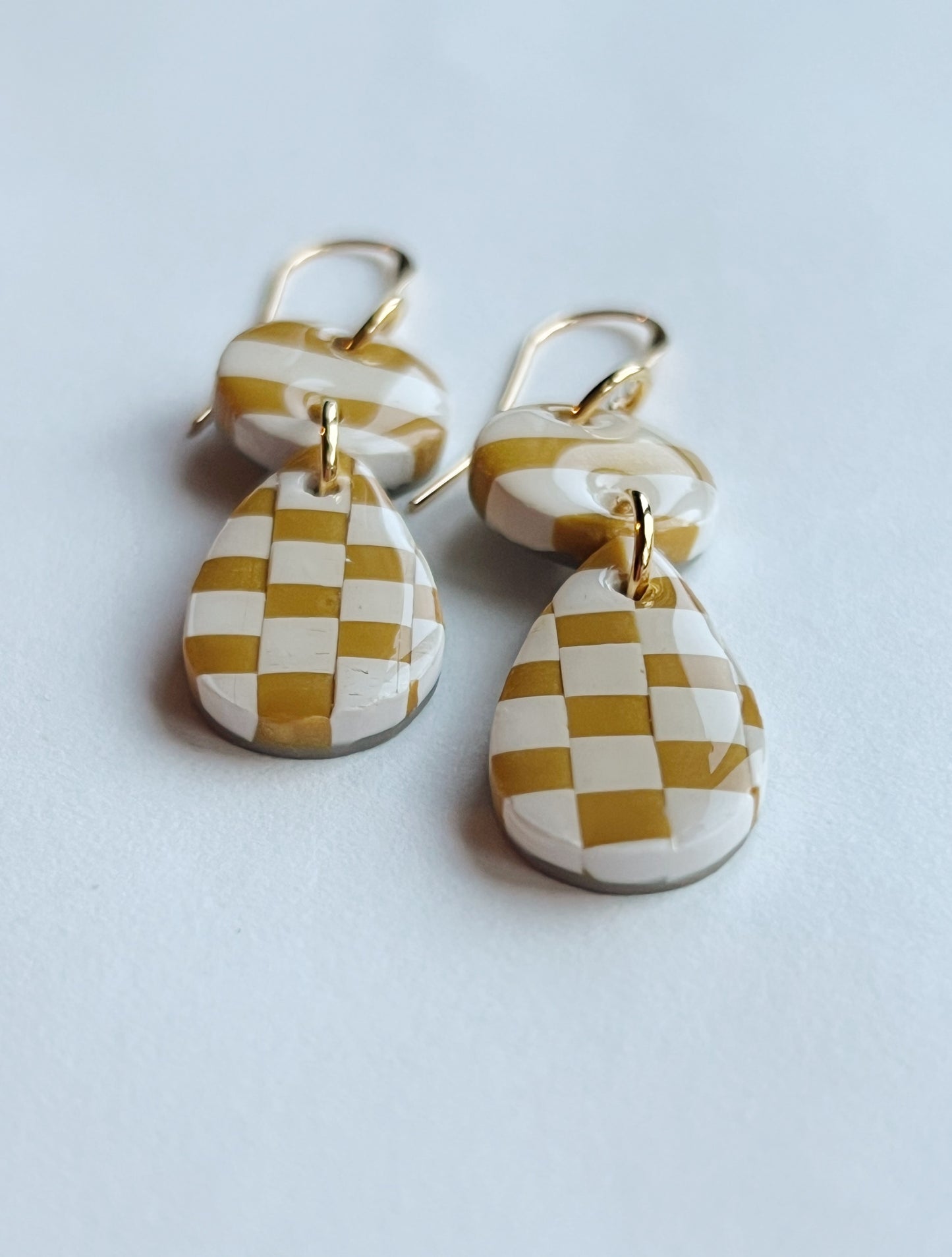 The Poppy Earring in mustard and cream