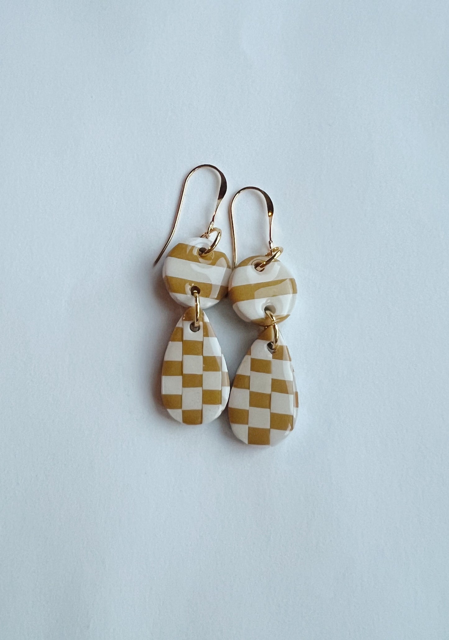 The Poppy Earring in mustard and cream