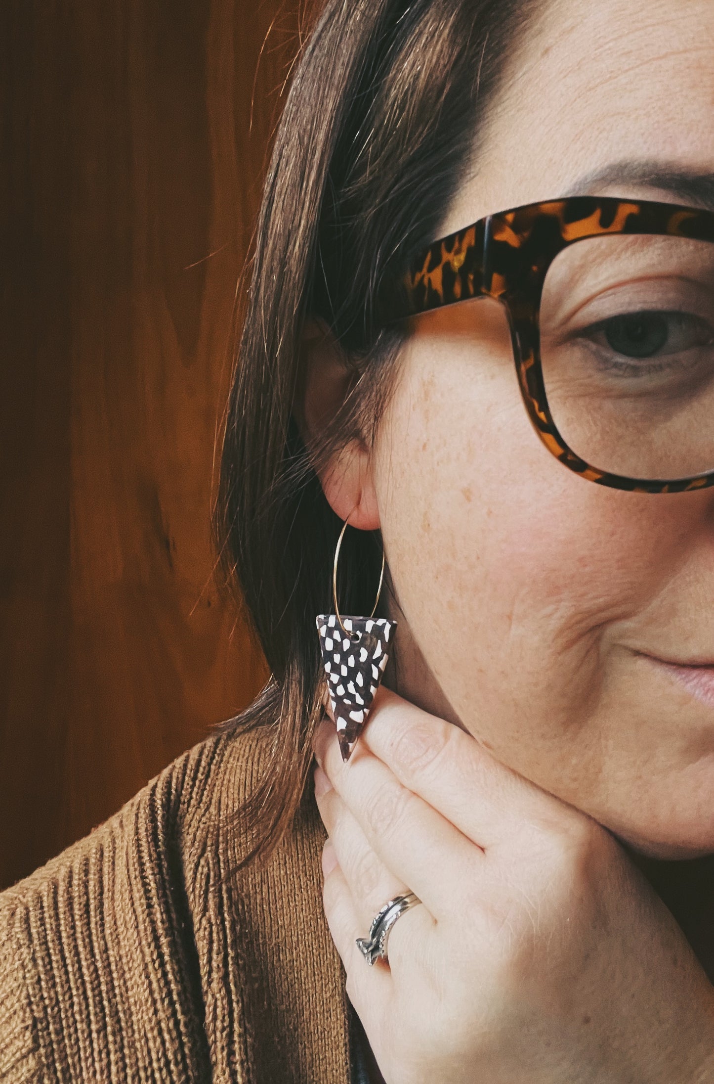 The Taper Earring in bronze and cream